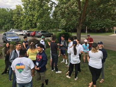 students talking at FYI