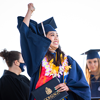 Student in robes at commencement