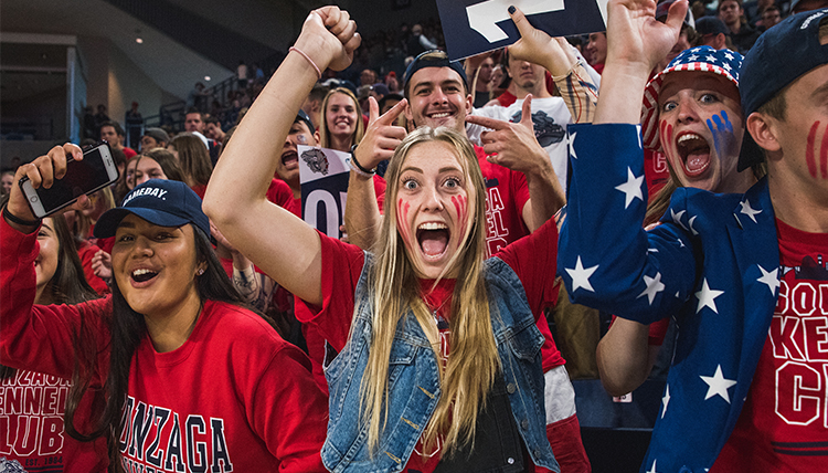 students are dressed up and painted up in The Kennel to cheer on the Zags
