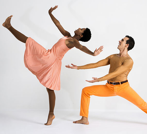 male dance catching female dancer in graceful backwards fall