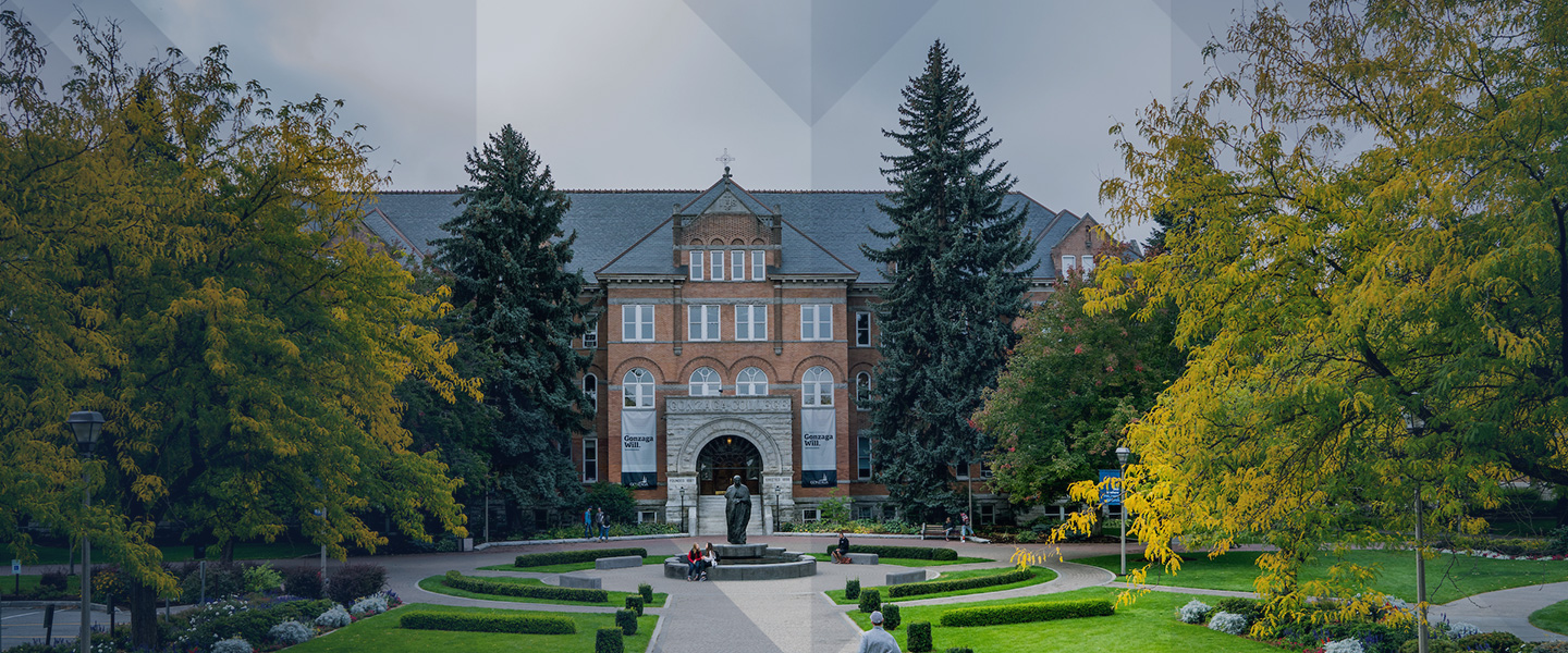 College Hall surrounded by lush foliage