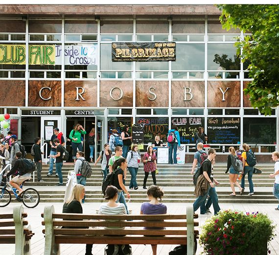 Busy students walking to class on campus.