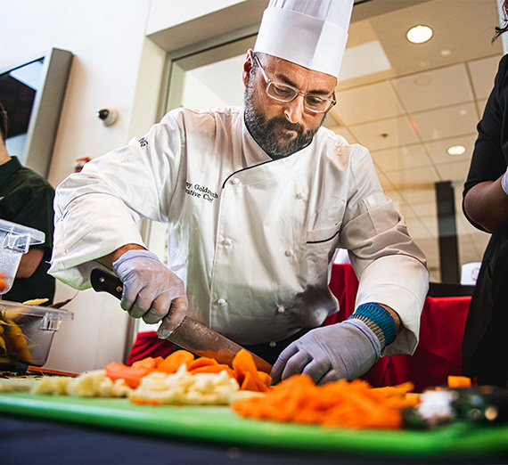 chef chopping vegetables