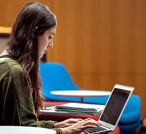 student working on laptop
