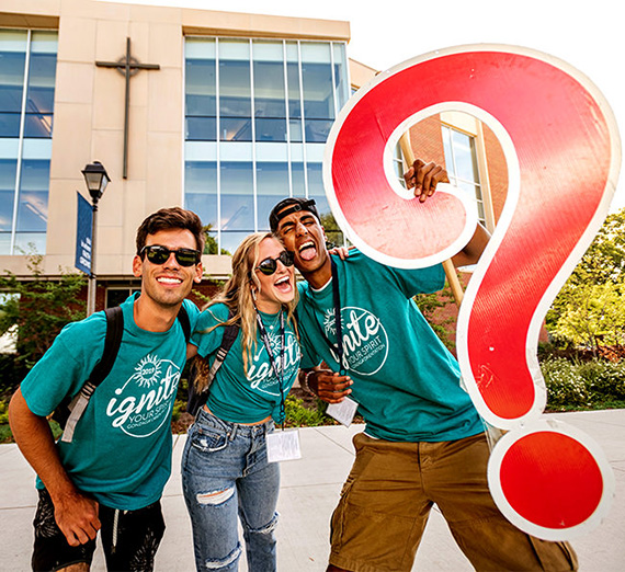 student volunteers pose for photo