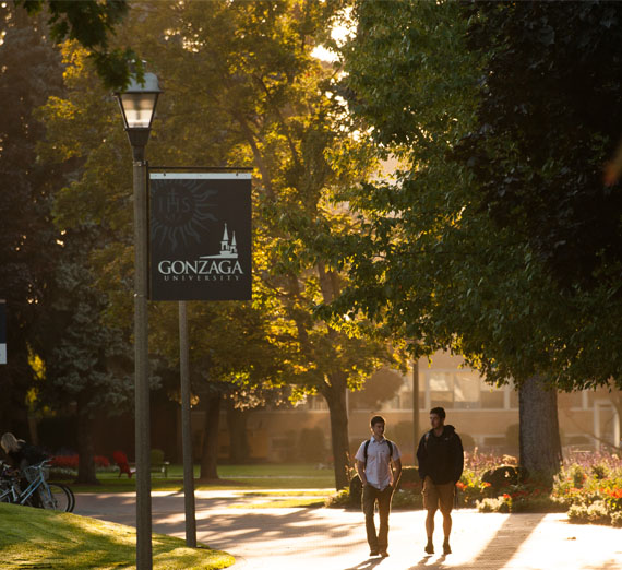 students walking on campus in the morning 