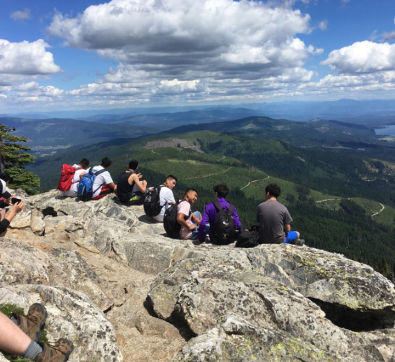students rest after their hike on the Francis Youth Institute