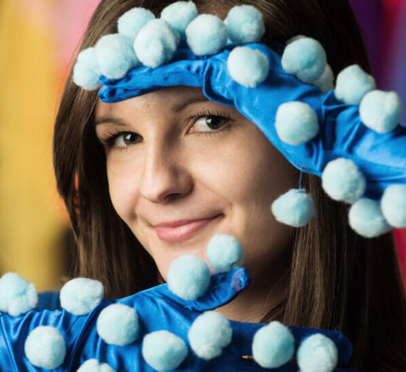 Alumna Miranda Heckman  (‘16, B.A. Biology; Minor, Dance) in a costume designed for "The Dancing Spokane River" production she choreographed