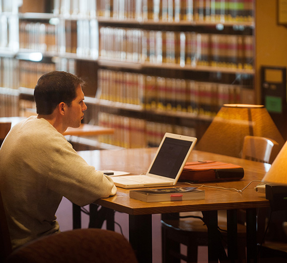 A student studies at the law library in Florence