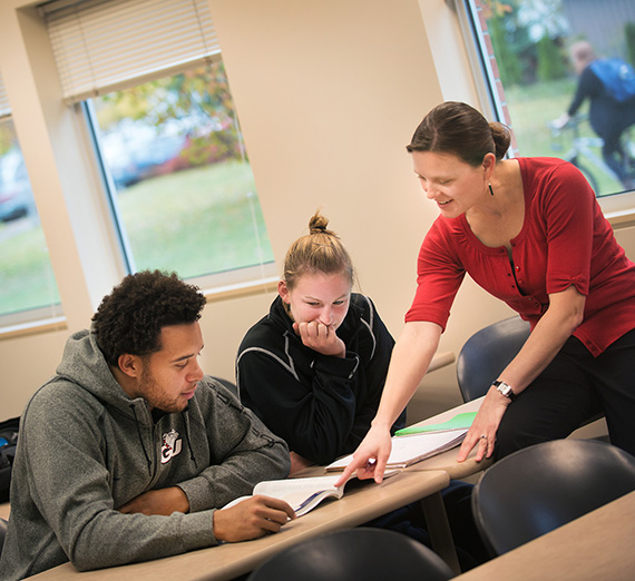Students receive help from their Marketing professor