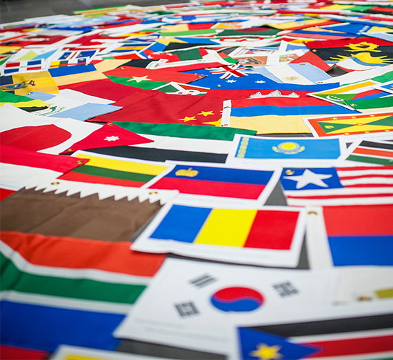 flags from many sountries layered on top of one another