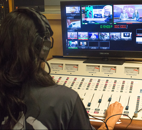 Broadcast student in at board.