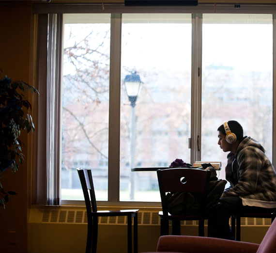 A student studying in lounge 