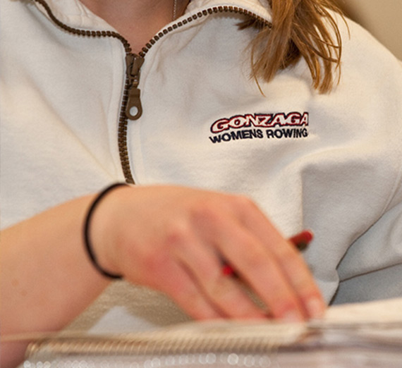 Student studying in book