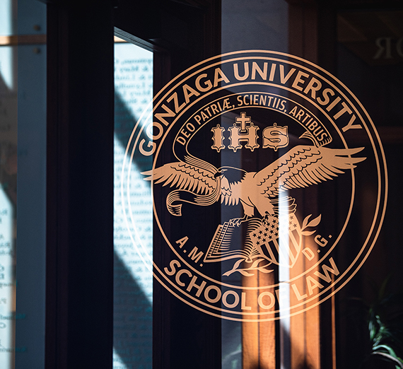 Glass door with Gonzaga Law seal printed on it