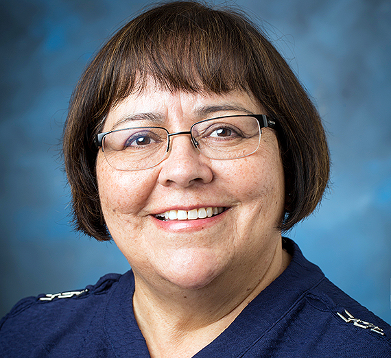 new mexican woman in suit