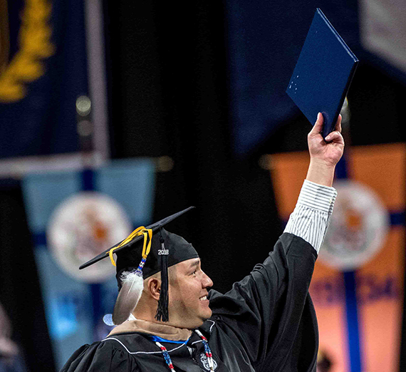 Gonzaga graduate with diploma.