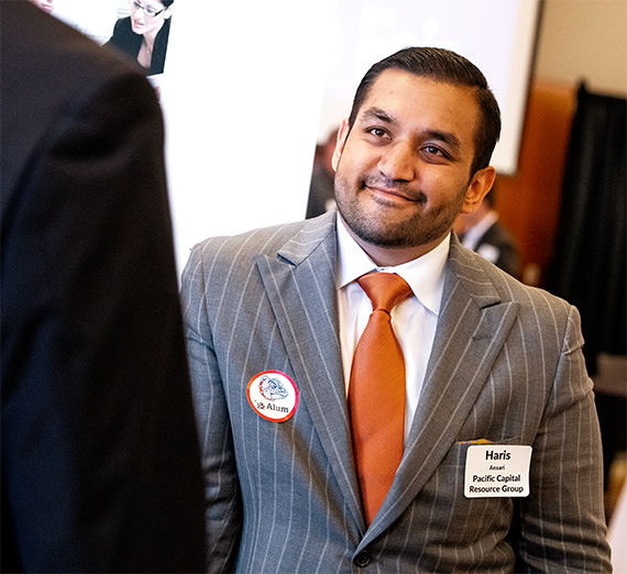 employee in suit at job fair