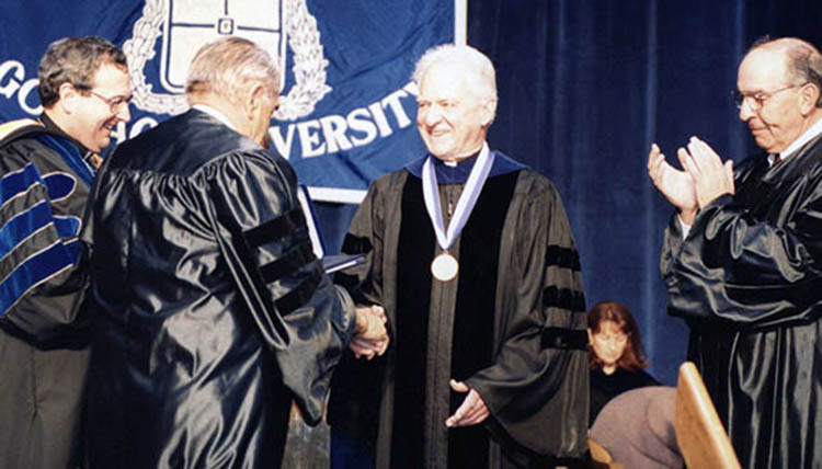 Fr. Coughlin at Gonzaga graduation ceremony
