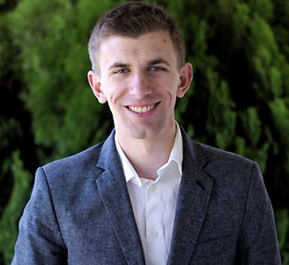 2015 graduate Chris Birmingham smiling. 