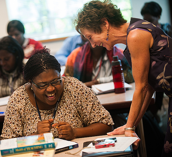 A teacher giving a classroom lecture