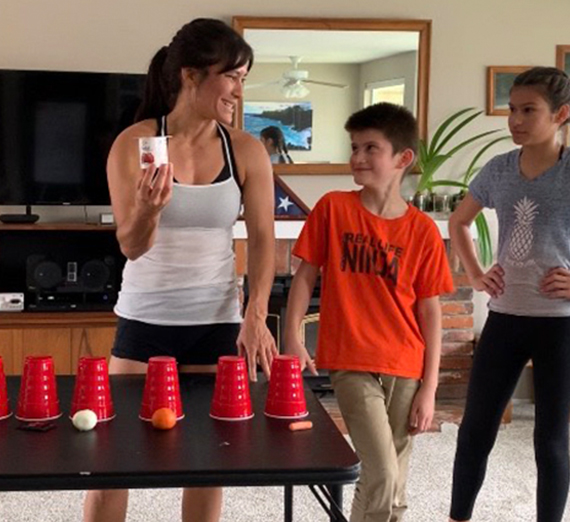 Gonzaga Alumna Sandy Zimmerman smiles at her two children