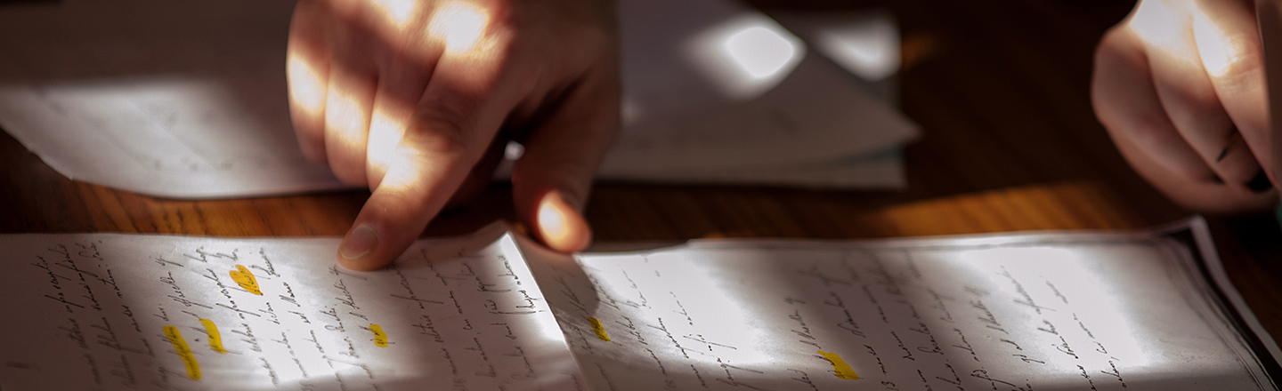 Classic civilizations department students studying classic Latin script.