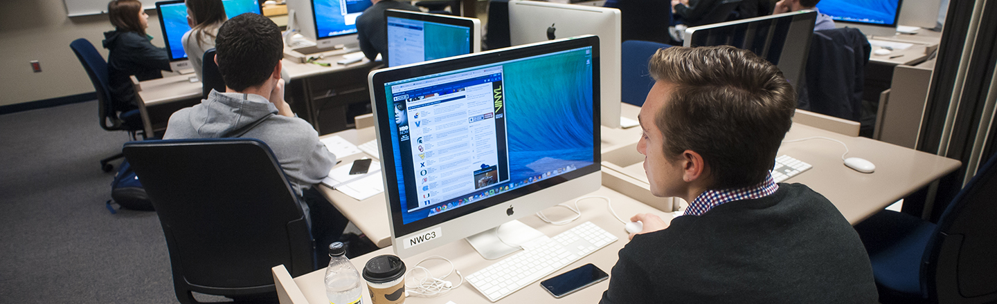 Computer Science Student using computer