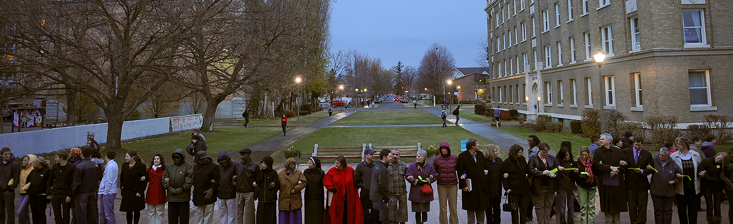 People lined up in solidarity on school campus