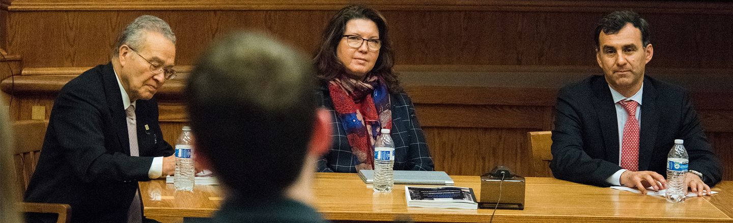 Panelists listening to question from audience member at 2018 GJIL Symposium