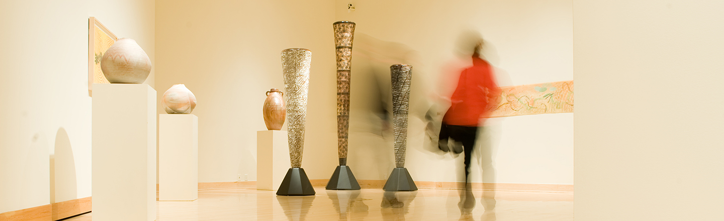 The Junt Art Gallery with person walking through.