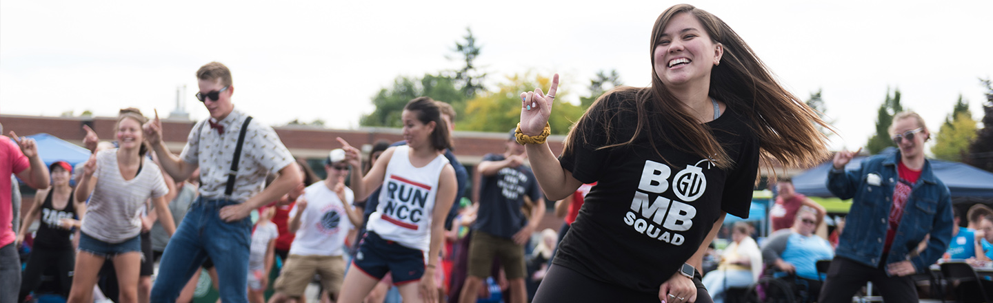 Bomb Squad leads a dance at the logan block party.