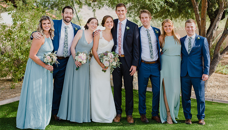 gonzaga couple, blue suits and dresses