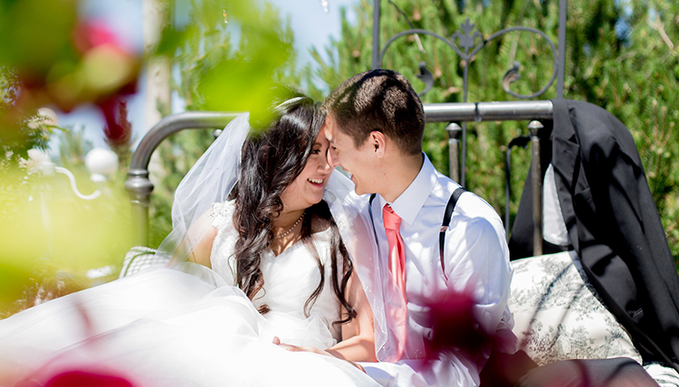 couple outdoors with flowers