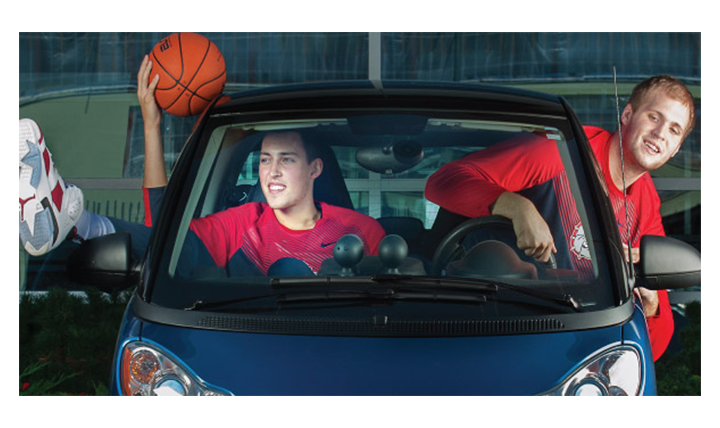 Kyle Wiltzer and Przemek Karnoski crowded in tiny car