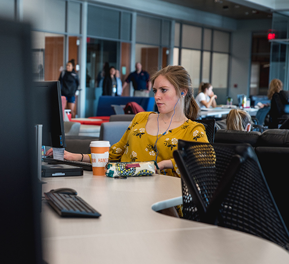 female student at computer in Volkar Center for Athletic Achievement