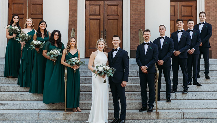large group posed on steps of St. Al's church