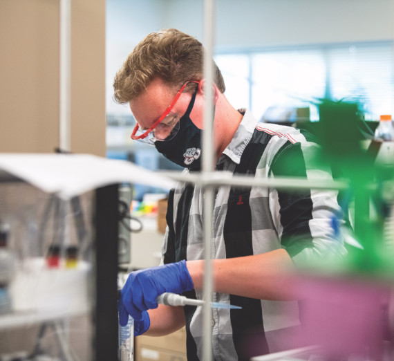 Student working in a bio lab