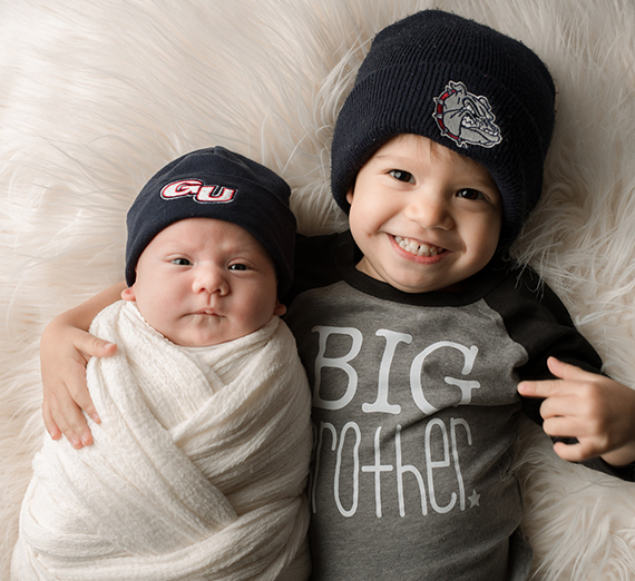 baby boy and his toddler brother