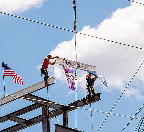 The final structural beam was placed in May, “topping off” the building that will become the new home for the University of Washington School of Medicine-Gonzaga University Health Partnership’s medical and health education, research and innovation center. (GU photo)