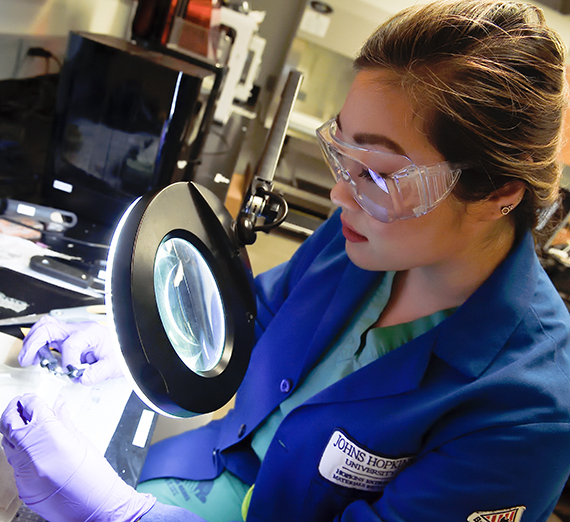Helen Xun in the lab at Johns Hopkins University. (Photo credit: Will Kirk / Johns Hopkins University)