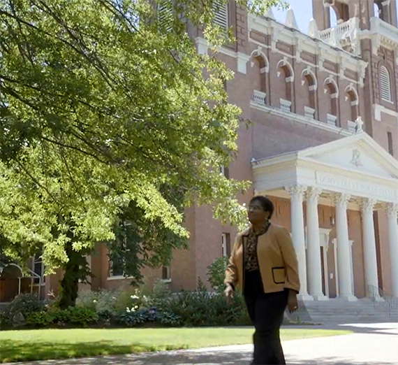 Dr. Charlita Shelton walks in front of St. Al's