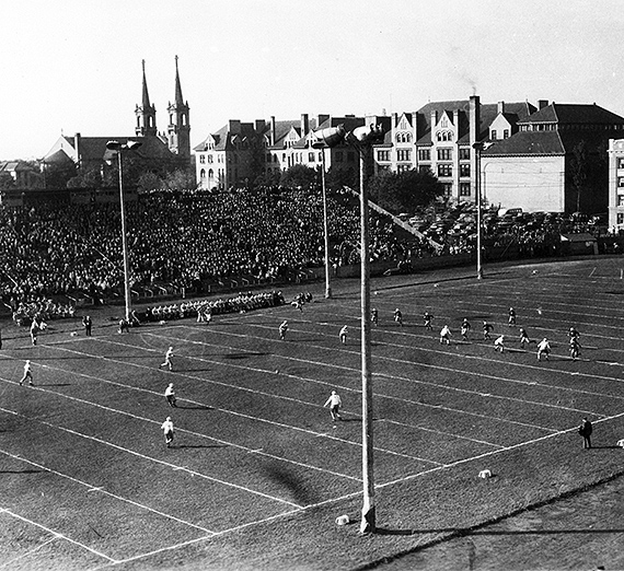 This 1930 photo depicts the view of the Gonzaga football stadium looking Northwest. Fans fill the stadium. (GU Archives)