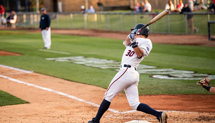 A Gonzaga baseball player goes to bat at a home game.