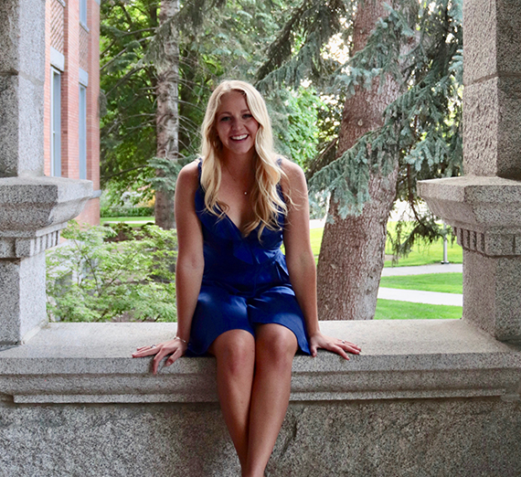 Frannie sitting outside College Hall
