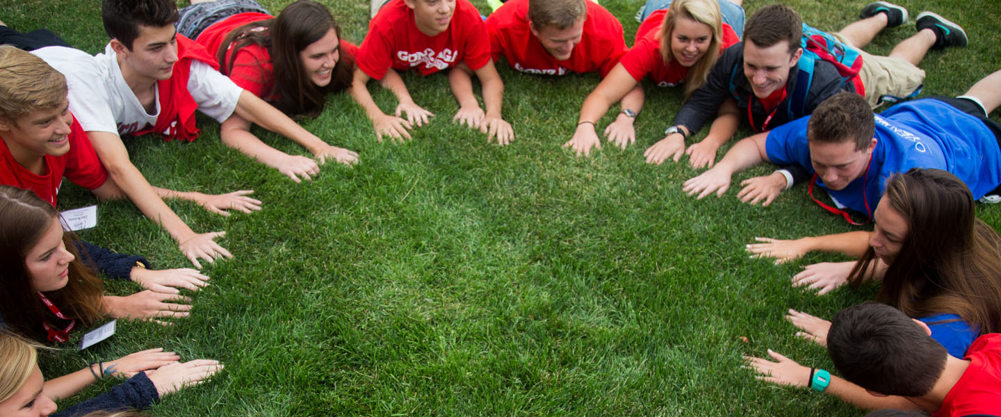 Students playing ice breaker game at orientation